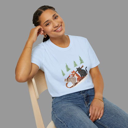 PAWSUPREMACY – Winter Cats Christmas T Shirt with Cozy Snowy Forest Scene Playful Sledding Cat Lover Graphic Tee for Holiday Season.